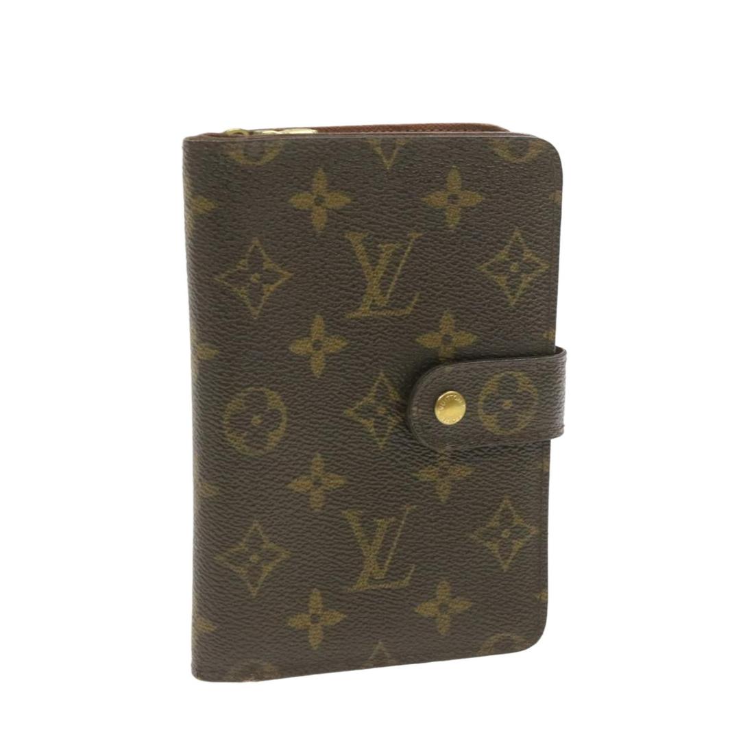 Authentic LOUIS VUITTON Monogram Porte Papier Zippe: Brand: LOUIS VUITTON Style: Wallet Material: Monogram Canvas Color: Monogram Made In: France Size (Inches): W4.3 x H6.1 x D1.1"(Approx) Exterior Condition: Monogram Canvas : slightly rubbing lose