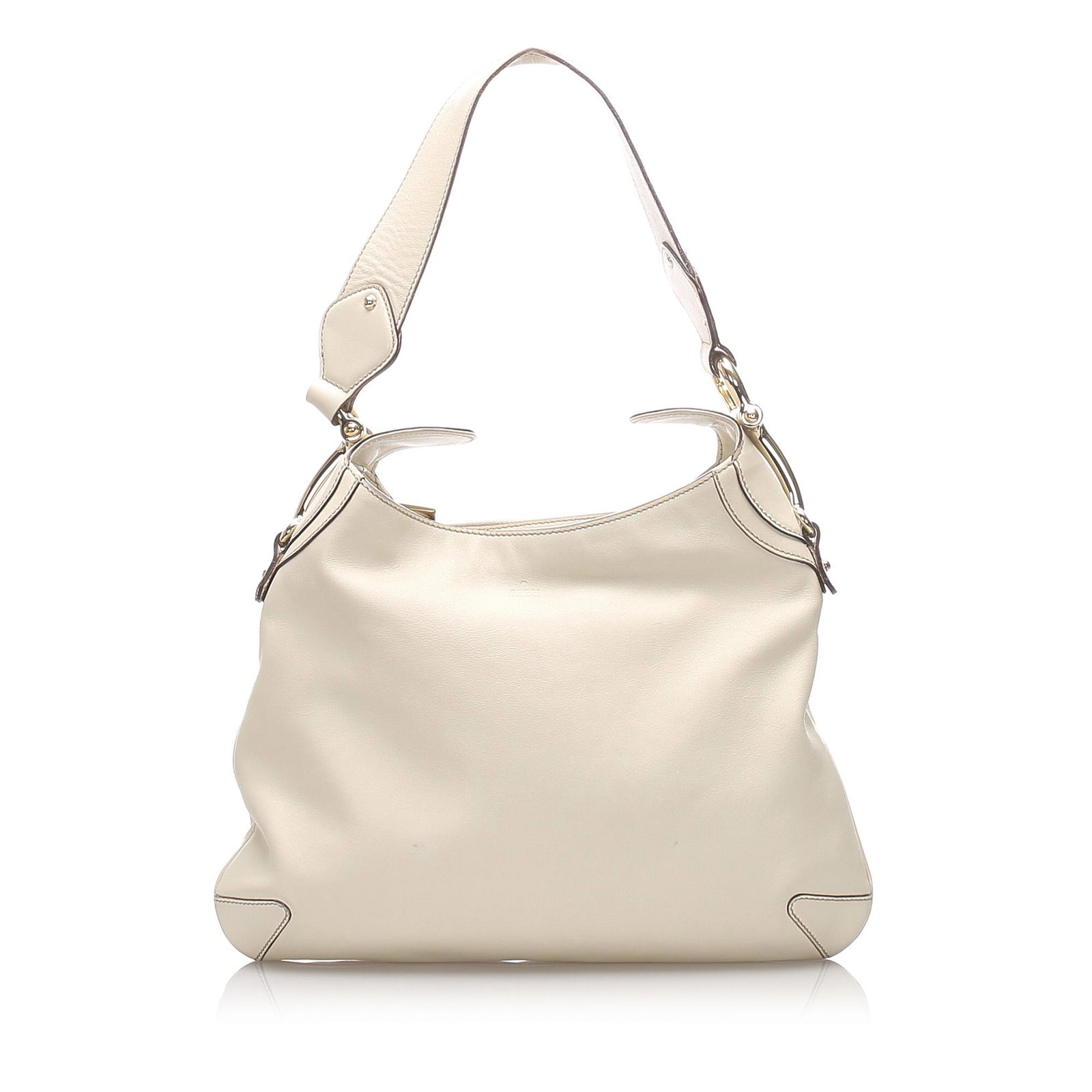 Authentic Gucci Horsebit Leather Creole Shoulder Bag: The Creole shoulder bag features a leather body, a flat leather strap with a silver-tone metal detail, a top zip closure, and an interior zip pocket. Brand: Gucci Model: Horsebit Leather Creole Should