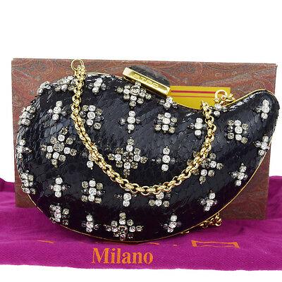 Authentic ETRO Messenger & Cross Body: Brand: ETRO Model: Messenger & Cross Body Country of Origin: Italy Material: Python Skin Leather Metal Rhinestone Color: Black Size (Inch): W7.1X H4.3X D2.8" Size (CM): W18X H11X D7Cm All Bidhaus item