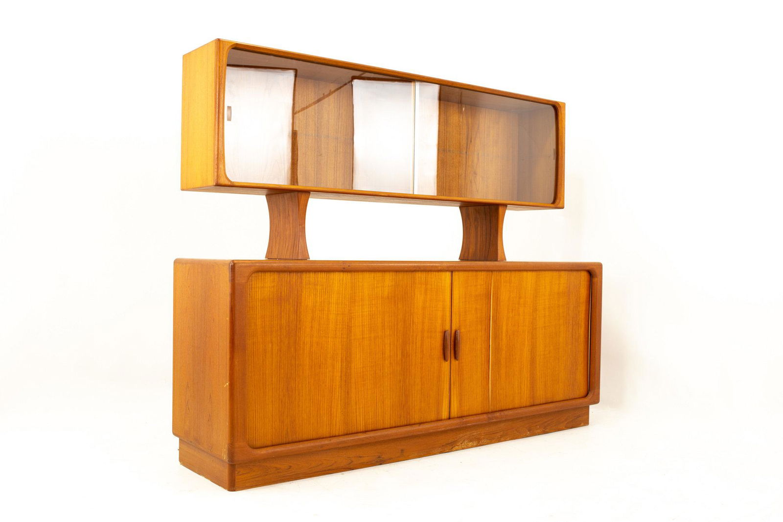 Dyrlund Mid Century Teak Plinth Base Tambour Door: Dyrlund Mid Century Teak Plinth Base Tambour Door Credenza with Glass Front Hutch Credenza measures: 74.5 wide x 19 deep x 30 high Hutch measures: 71 wide x 12.5 deep x 30 high Credenza and hutch toge