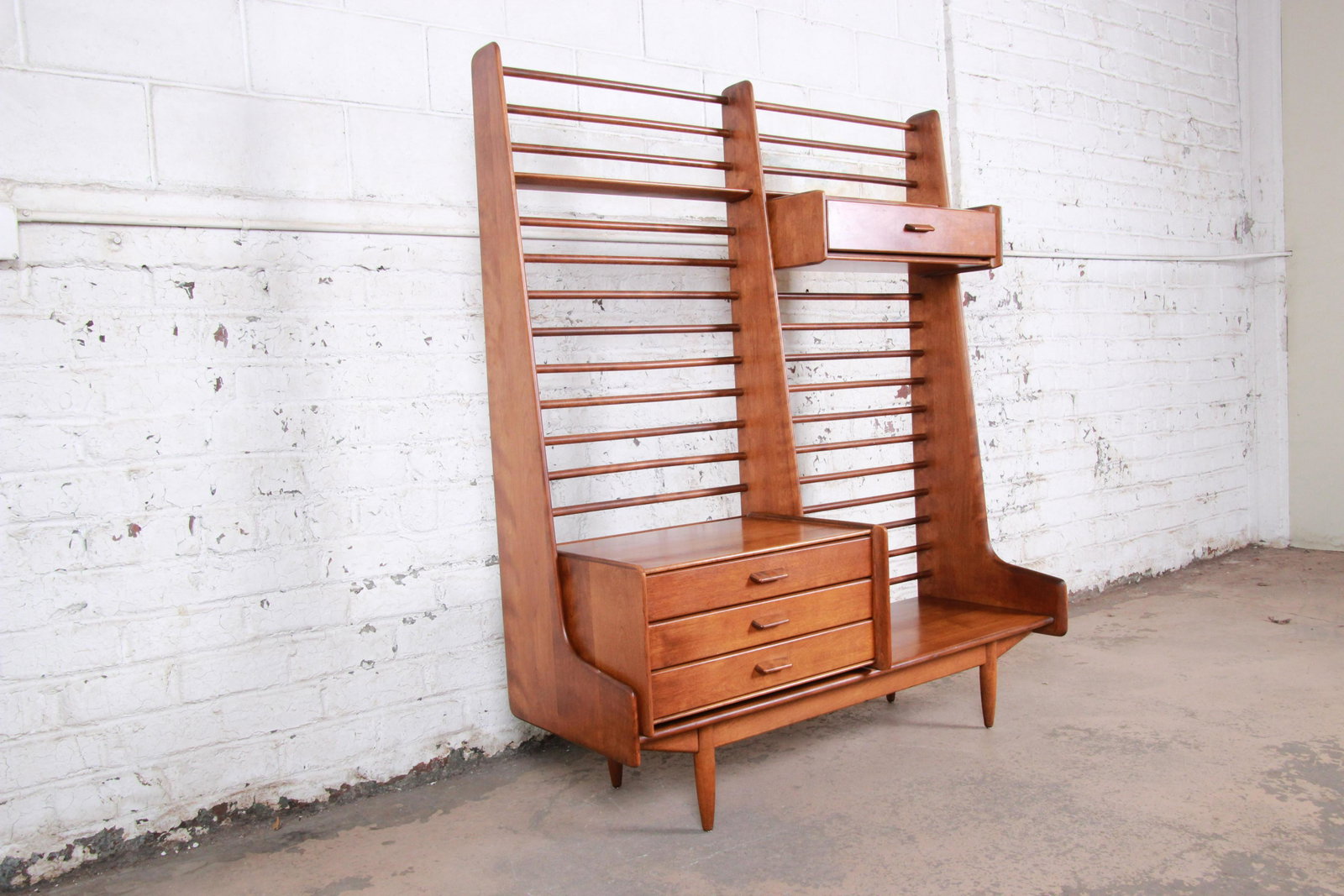 Authentic Leslie Diamond for Conant Ball Norsemates: A rare and outstanding mid-century modern self-standing room divider or wall unit designed by Leslie Diamond for Conant Ball. The wall unit features solid birch construction and sleek mid-century desi