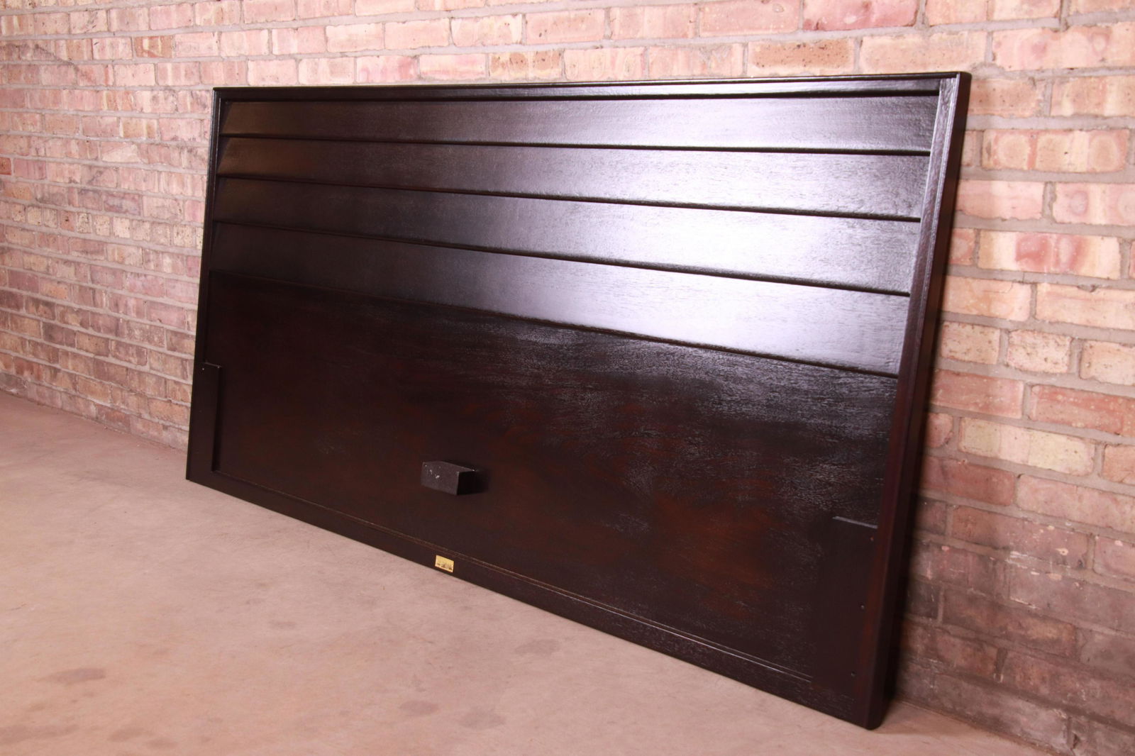 Authentic Edward Wormley for Dunbar Ebonized Mahogany: A rare and exceptional mid-century modern king size headboard By Edward Wormley for Dunbar Furniture USA 1950s Newly ebonized mahogany with unique louvered front design. Measures: 78"W x 1.38"D x 38"H