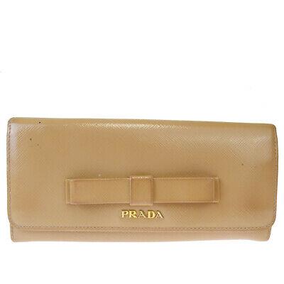 Authentic PRADA Wallet: Brand: PRADA Model: Wallet Country of Origin: Italy Material: Leather Color: Beige Size (Inch): W7.5X H3.5X D0" Size (CM): W19X H9X D0Cm All Bidhaus items come with a 100 % money-back authenticity gua