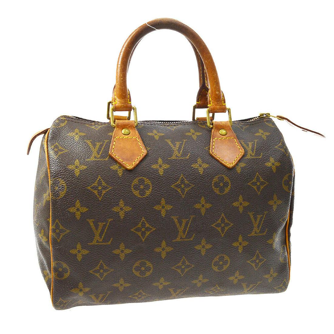 Authentic LOUIS VUITTON Speedy 25 Double Handles: Brand: LOUIS VUITTON Model: Speedy 25 Double Handles Country of Origin: United States Material: Canvas Color: Brown Size (Inch): W 9.8 x H 7.5 x D 5.9 " Handle Drop. 3.5 " Size (CM): W 25.0 x H 19.0 x