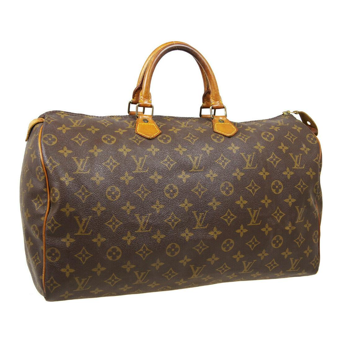 Authentic LOUIS VUITTON Monogram Double Handles: Brand: LOUIS VUITTON Model: Monogram Double Handles Country of Origin: France Material: Canvas Color: Brown Size (Inch): W 16.1 x H 9.8 x D 7.9 " Handle Drop. 3.5 " Size (CM): W 41.0 x H 25.0 x D 20.0