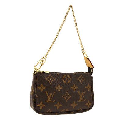 Authentic LOUIS VUITTON Monogram Top Handle: Brand: LOUIS VUITTON Model: Monogram Top Handle Country of Origin: France Material: Canvas Color: Brown Size (Inch): W 5.9 x H 3.7 x D 1.2 " Handle Drop. 5.9 " Size (CM): W 15.0 x H 9.5 x D 3.0 cm Han