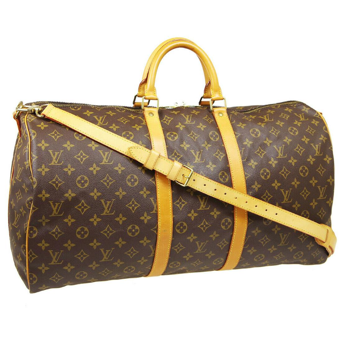 Authentic LOUIS VUITTON Keepall Bandouliere 55 Double: Brand: LOUIS VUITTON Model: Keepall Bandouliere 55 Double Handles Country of Origin: France Material: Canvas Color: Brown Size (Inch): W 22.0 x H 11.8 x D 9.8 " Handle Drop. 4.3 " Strap Drop. 18.5 - 2