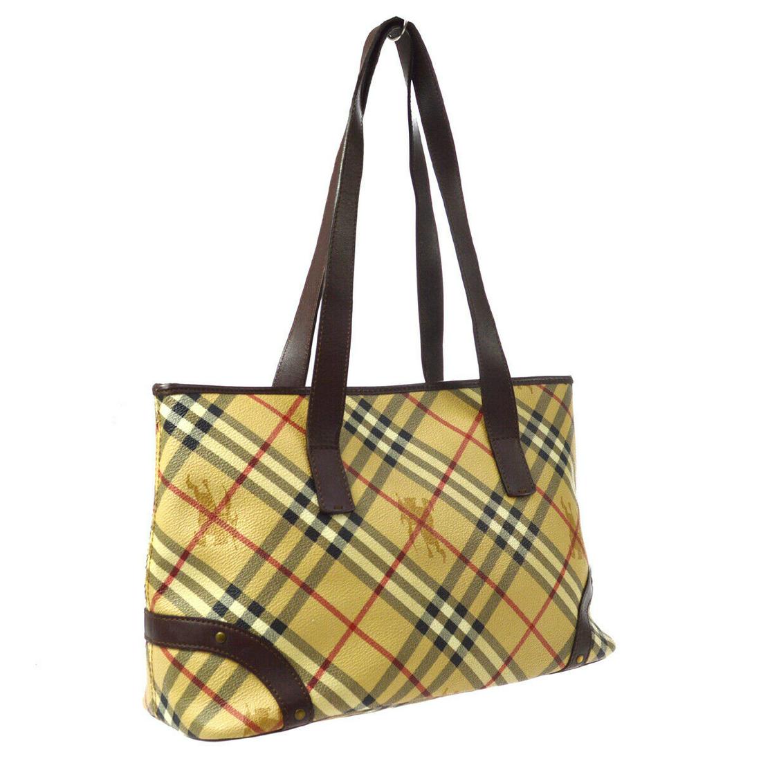 Authentic BURBERRY Tote Bag Double Handles: Brand: BURBERRY Model: Tote Bag Double Handles Country of Origin: Italy Material: Canvas Color: Beige Brown Size (Inch): W 13.8 x H 9.1 x D 5.1 " Strap Drop. 9.8 " Size (CM): W 35.0 x H 23.0 x D 13.0