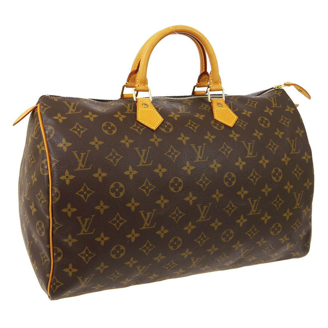 Authentic LOUIS VUITTON Monogram Double Handles: Brand: LOUIS VUITTON Model: Monogram Double Handles Country of Origin: France Material: Canvas Color: Brown Size (Inch): W 16.1 x H 9.8 x D 7.5 " Handle Drop. 3.5 " Size (CM): W 41.0 x H 25.0 x D 19.0