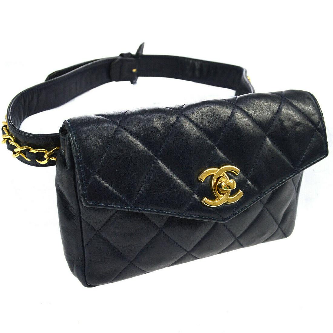 Authentic CHANEL Chain Bum Bag: Brand: CHANEL Model: Chain Bum Bag Country of Origin: Italy Material: Leather Color: Navy Size (Inch): W 6.7 x H 4.7 x D 1.4 " Belt Size. 23.6 - 25.6 " #26/65 Size (CM): W 17.0 x H 12.0 x D 3.5 cm Bel