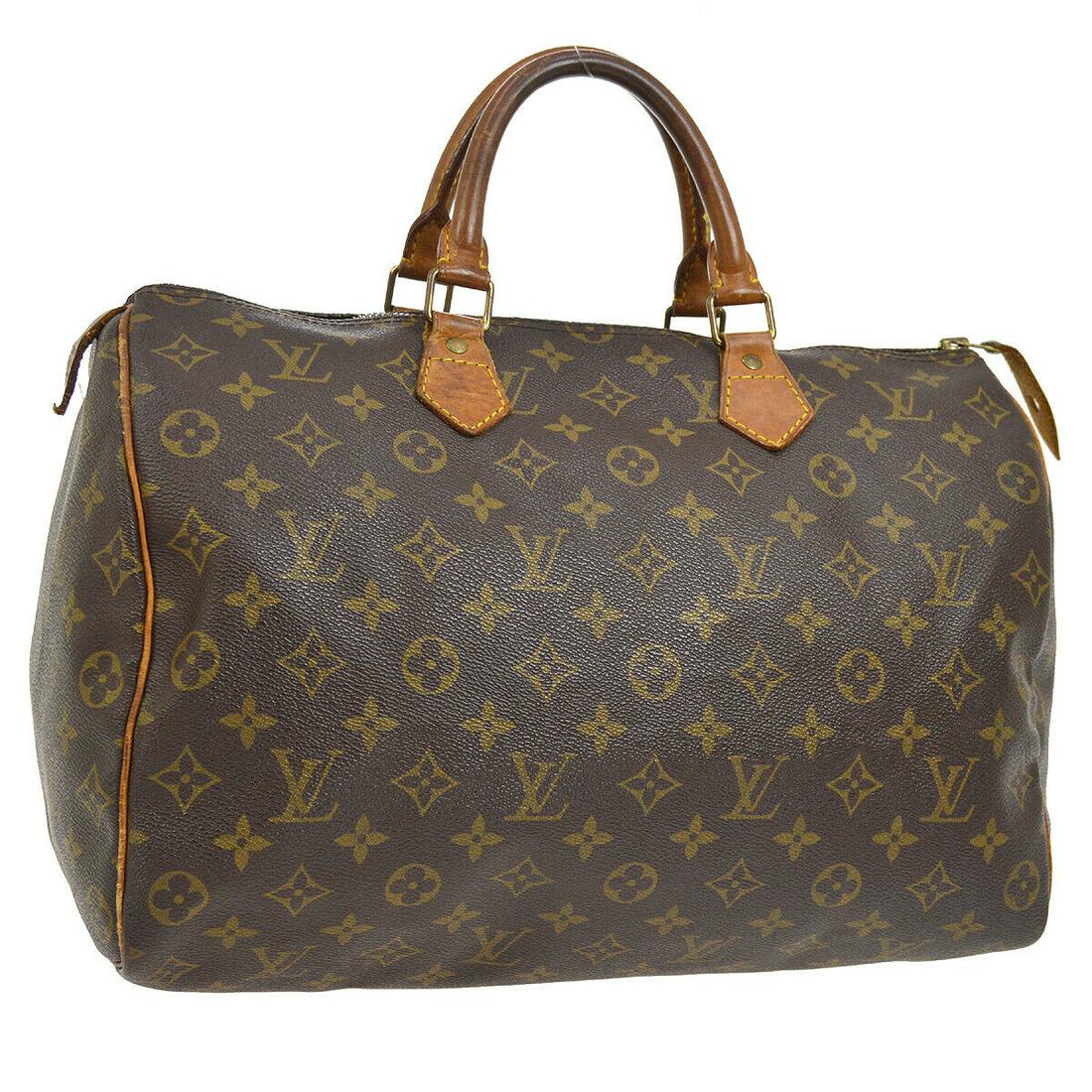 Authentic LOUIS VUITTON Hand Bag: Brand: LOUIS VUITTON Model: Hand Bag Country of Origin: France Material: Monogram Canvas Leather Color: Brown Size (Inch): W 14.0 x H 9.1 x D 7.5 " Handle Drop. 3.5 " Size (CM): W 35.5 x H 23.0 x D 19