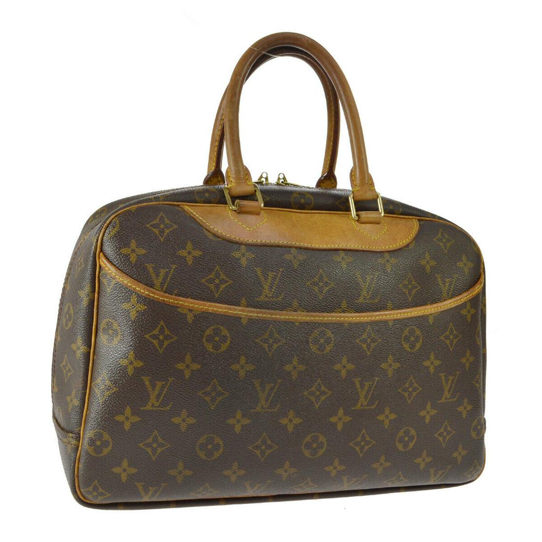 Authentic LOUIS VUITTON Monogram Double Handles: Brand: LOUIS VUITTON Model: Monogram Double Handles Country of Origin: France Material: Leather Color: Brown Size (Inch): W 13.8 x H 10.2 x D 5.1 " Handle Drop. 5.1 " Size (CM): W 35.0 x H 26.0 x D 13