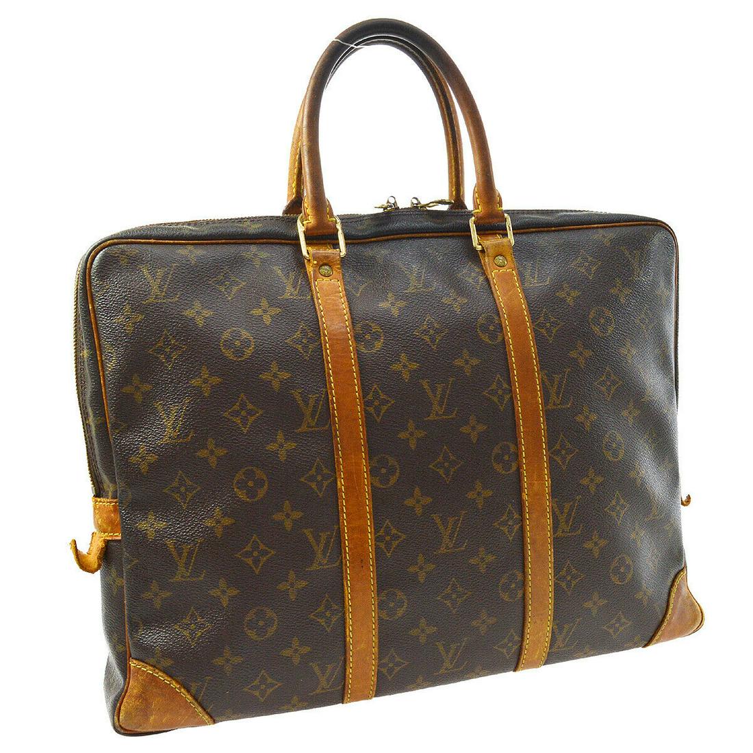 Authentic LOUIS VUITTON Monogram Double Handles: Brand: LOUIS VUITTON Model: Monogram Double Handles Country of Origin: France Material: Leather Color: Brown Size (Inch): W 15.7 x H 11.4 x D 2.4 " Handle Drop. 5.1 " Size (CM): W 40.0 x H 29.0 x D 6.