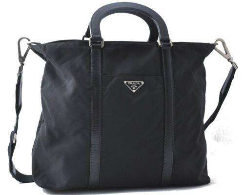 Authentic PRADA Hand Bag: Brand: PRADA Model: Hand Bag Country of Origin: Italy Material: Nylon Color: Black Bag Length: 13.2inches (33.5cm) Bag Height: 11.6inches (29.5cm) Bag Depth: 4.1inches (10.5cm) All Bidhaus items come 