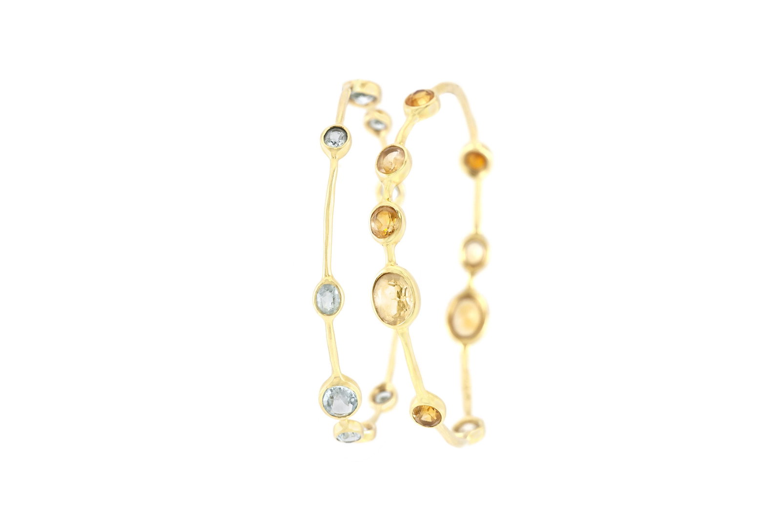 Authentic Two Ippolita Bangles with Citrine and: The bangles are finely crafted in 18k yellow gold. One bracelet with aquamarine and the second one with citrine stones. All Bidhaus items come with a 100% money-back authenticity guarantee. ALL SALES 