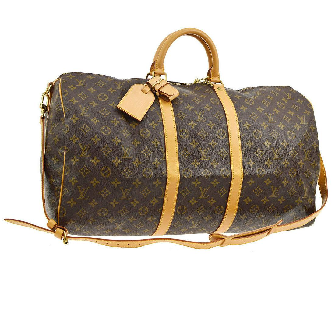 Authentic LOUIS VUITTON Travel Hand Bag: Brand: LOUIS VUITTON Model: Travel Hand Bag Country of Origin: France Material: Monogram Canvas Leather Color: Brown Size (Inch): W 22.0 " x H 11.4 " x D 9.8 " Handle Drop. 4.7 " Strap Drop. 19.3 - 22