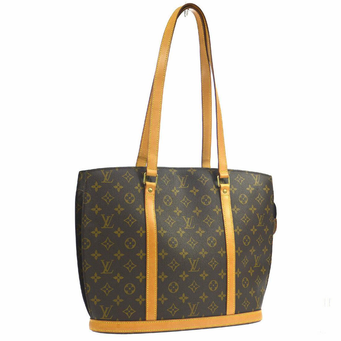 Authentic LOUIS VUITTON Monogram Tote: Brand: LOUIS VUITTON Model: Monogram Tote Country of Origin: France Material: Alcantara Color: Brown Size (Inch): W 13.8 x H 12.2 x D 4.3 " Strap Drop. 11.4 " Size (CM): W 35.0 x H 31.0 x D 11.0 cm St