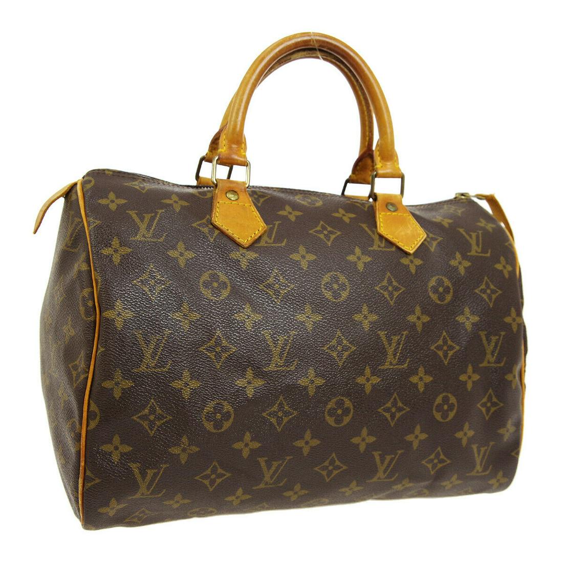 Authentic LOUIS VUITTON Hand Bag: Brand: LOUIS VUITTON Model: Hand Bag Country of Origin: France Material: Monogram Canvas Leather Color: Brown Size (Inch): W 11.8 x H 8.5 x D 6.9 " Handle Drop. 3.5 " Size (CM): W 30.0 x H 21.5 x D 17