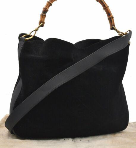 Authentic GUCCI Hand Bag: Brand: GUCCI Model: Hand Bag Country of Origin: Italy Material: Suede Color: Black Bag Length: 15.4inches (39cm) Bag Height: 11.8inches (30cm) Bag Depth: 4.7inches (12cm) All Bidhaus items come with a
