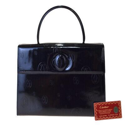 Authentic CARTIER Hand Bag: Brand: CARTIER Model: Hand Bag Country of Origin: France Material: Patent Leather Color: Navy Blue Size (Inch): W10.6X H8.3X D3.1"Size (CM): W27X H21X D8Cm All Bidhaus items come with a 100 % money-ba