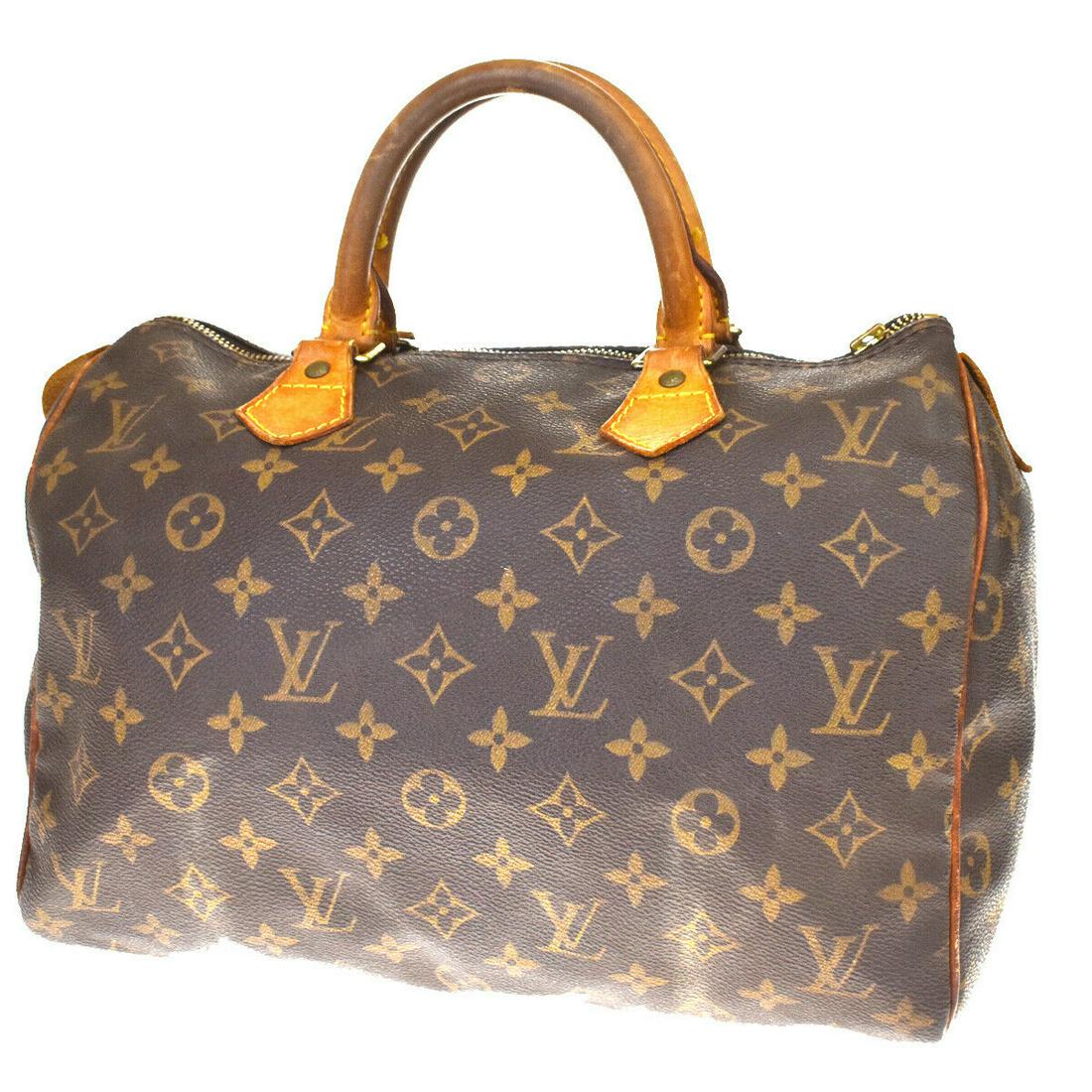 Authentic LOUIS VUITTON Hand Bag: Brand: LOUIS VUITTON Model: Hand Bag Country of Origin: France Material: Monogram Leather Color: Brown Size (Inch): W 11.8 X H 8.3 X D 6.7 "Size (CM): W 30 X H 21 X D 17 Cm All Bidhaus items come with