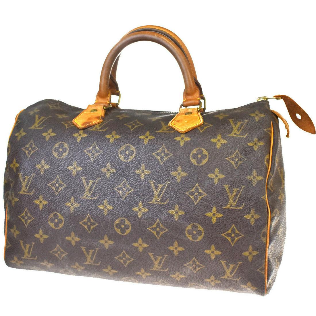 Authentic LOUIS VUITTON Hand Bag: Brand: LOUIS VUITTON Model: Hand Bag Country of Origin: France Material: Monogram Leather Color: Brown Size (Inch): W 11.8 X H 8.3 X D 6.7 "Size (CM): W 30 X H 21 X D 17 Cm All Bidhaus items come with