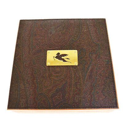 Authentic ETRO Jewelry Case: Brand: ETRO Model: Jewelry Case Country of Origin: Material: PVC Leather Color: Brown Orange Size (Inch): W7.9X H2.8X D7.9"Size (CM): W20X H7X D20Cm All Bidhaus items come with a 100 % money-back auth