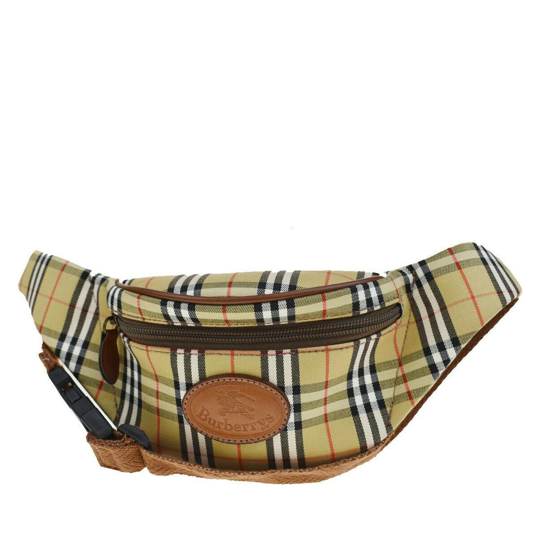 Authentic BURBERRY Bum Bag: Brand: BURBERRY Model: Bum Bag Country of Origin: Material: Canvas Leather Color: Brown Beige Size (Inch): W7.5X H4.5X D0.8"Size (CM): W19X H11.5X D2Cm All Bidhaus items come with a 100 % money-back a