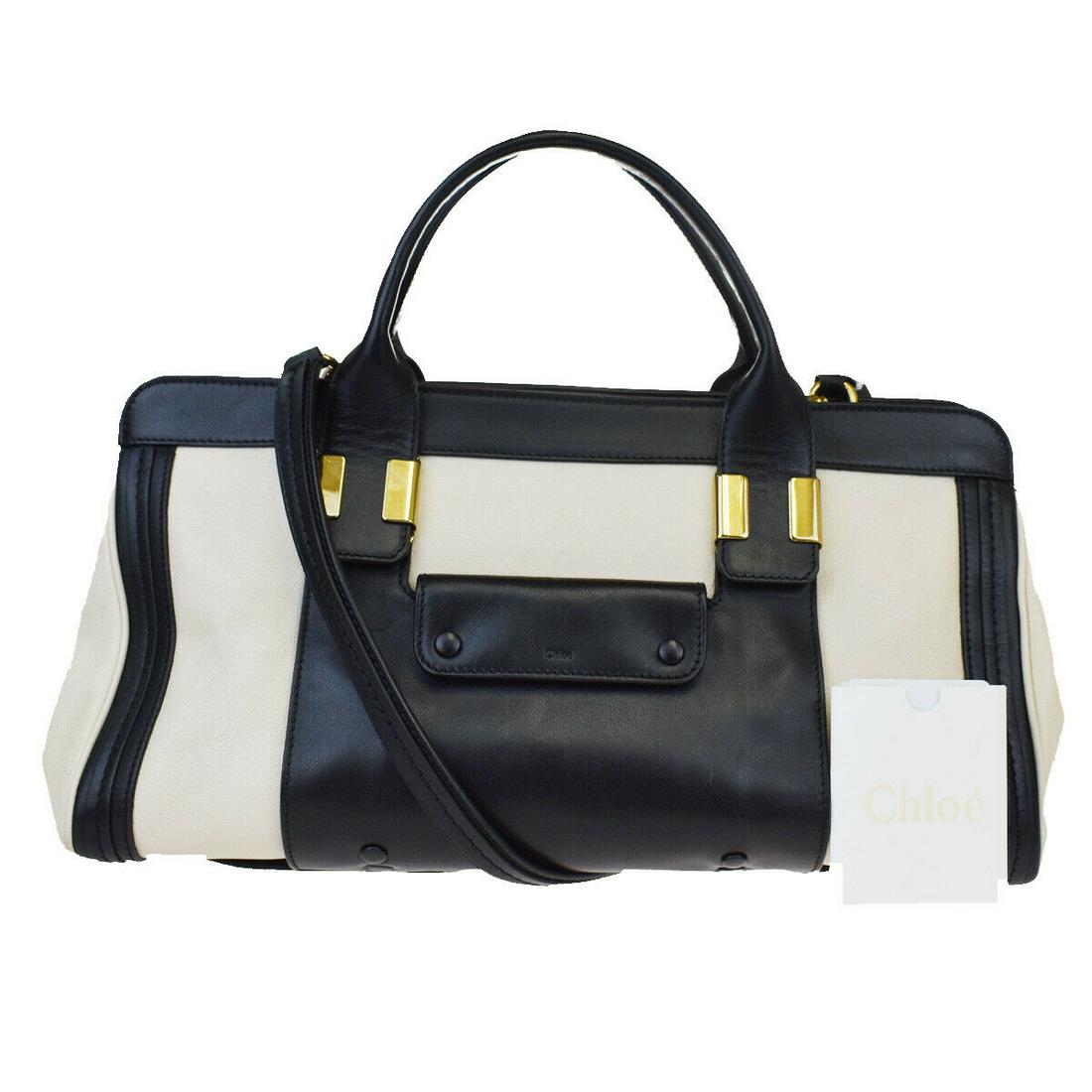 Authentic CHLOE Shoulder Hand Bag: Brand: CHLOE Model: Shoulder Hand Bag Country of Origin: Material: Leather Color: Ivory Black Size (Inch): W14.6X H8.3X D6.3"Size (CM): W37X H21X D16Cm All Bidhaus items come with a 100 % money-back a