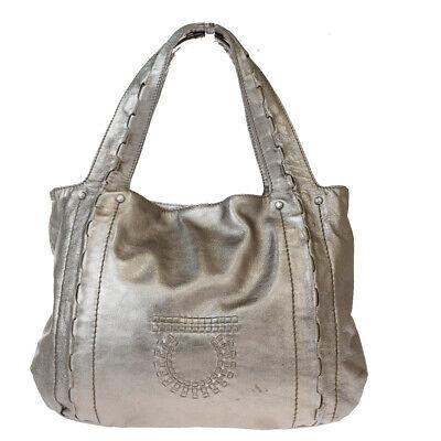 Authentic SALVATORE FERRAGAMO Hand Bag: Brand: SALVATORE FERRAGAMO Model: Hand Bag Country of Origin: Material: Leather Color: Silver Size (Inch): W12.6X H9.4X D2.4"Size (CM): W32X H24X D6Cm All Bidhaus items come with a 100 % money-back au