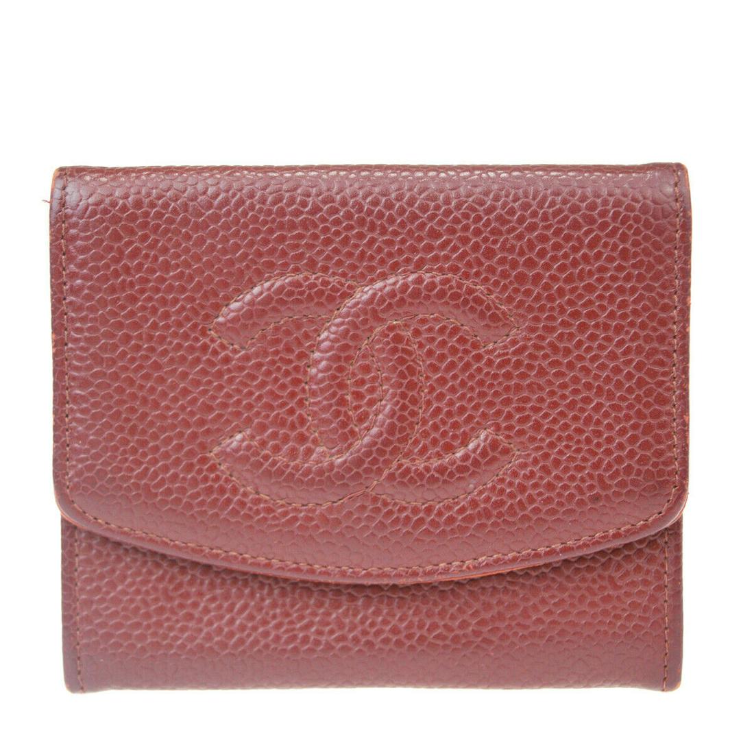 Authentic CHANEL Coin Case: Brand: CHANEL Model: Coin Case Country of Origin: Italy Material: Caviar Skin Leather Color: Red Size (Inch): W3.7X H3.1X D0"Size (CM): W9.5X H8X D0Cm All Bidhaus items come with a 100 % money-back au