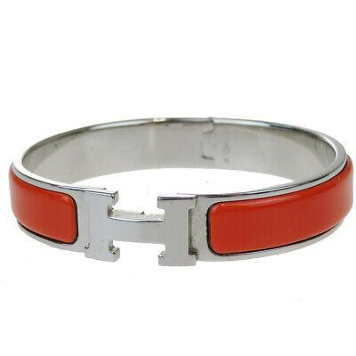 Authentic HERMES Bracelet: Brand: HERMES Model: Bracelet Country of Origin: Material: Metal Color: Silver Orange Size (Inch): W2.4X H4.3X D0"Size (CM): W6X H11X D0Cm All Bidhaus items come with a 100 % money-back authenticity g