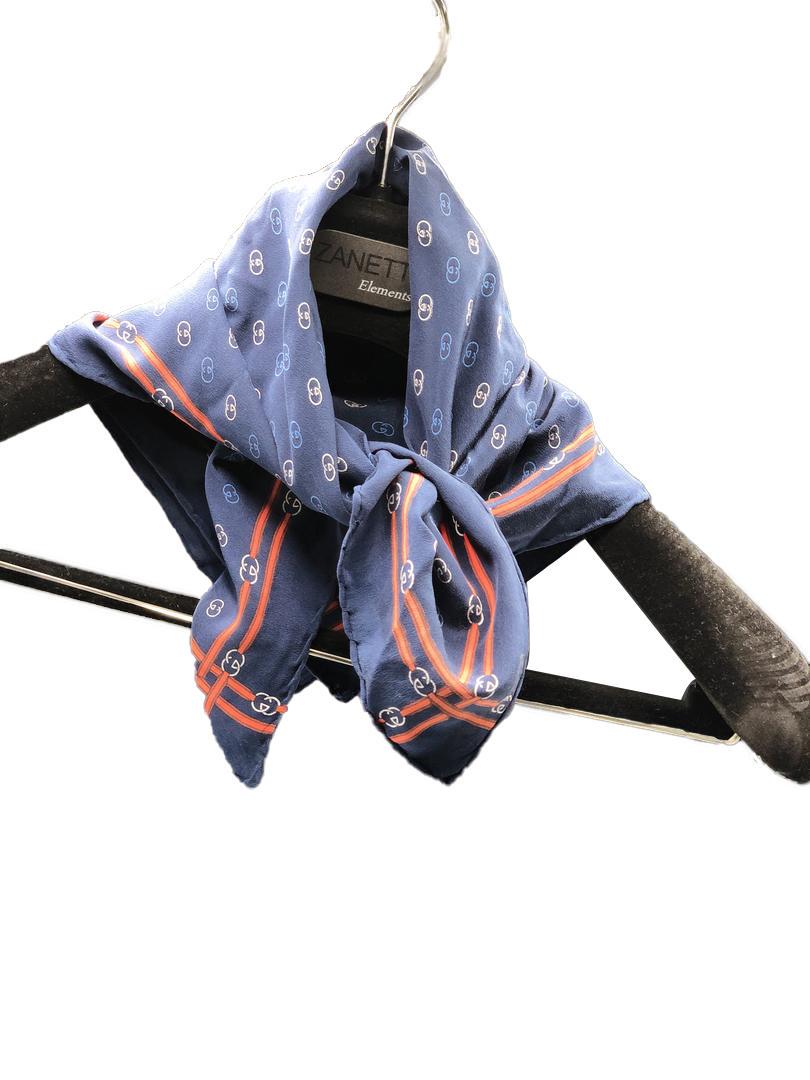 Authentic Gucci Navy Scarf: Brand: Gucci Material: Silk Style: Scarf Color: Navy Size(inch): 21 x 21 Country of Origin: Italy All Bidhaus items come with a 100% money-back authenticity guarantee. ALL SALES ARE FINAL. Please refe