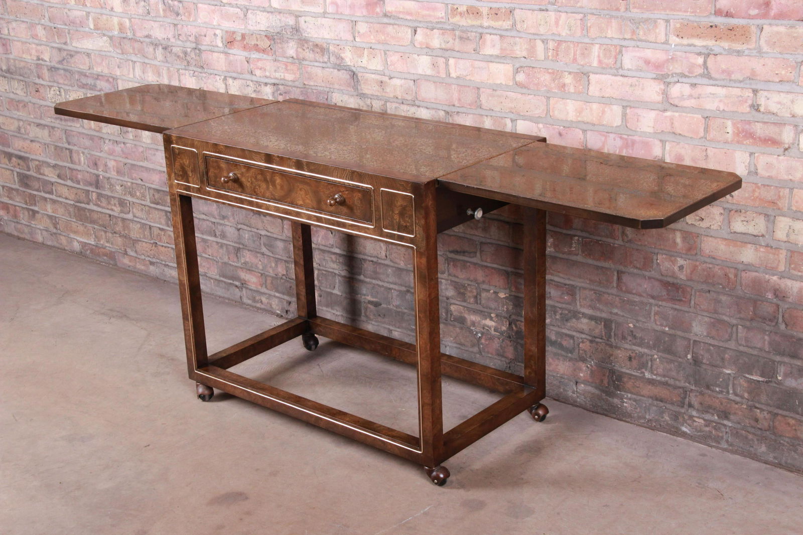 Authentic Bernhard Rohne for Mastercraft Hollywood: A gorgeous mid-century modern Hollywood Regency extending bar cart or server By Bernhard Rohne for Mastercraft Furniture USA 1970s Burled Carpathian elm wood + etched brass. Measures: 34"W x 18.63"D x