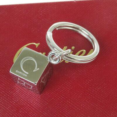 Authentic CARTIER Bag Charm Key Ring: Brand: CARTIER Model: Bag Charm Key Ring Country of Origin: Material: Silver Plated Color: Silver Size (Inch): W0.8X H1X D0"Size (CM): W2X H2.5X D0Cm All Bidhaus items come with a 100 % money-back aut