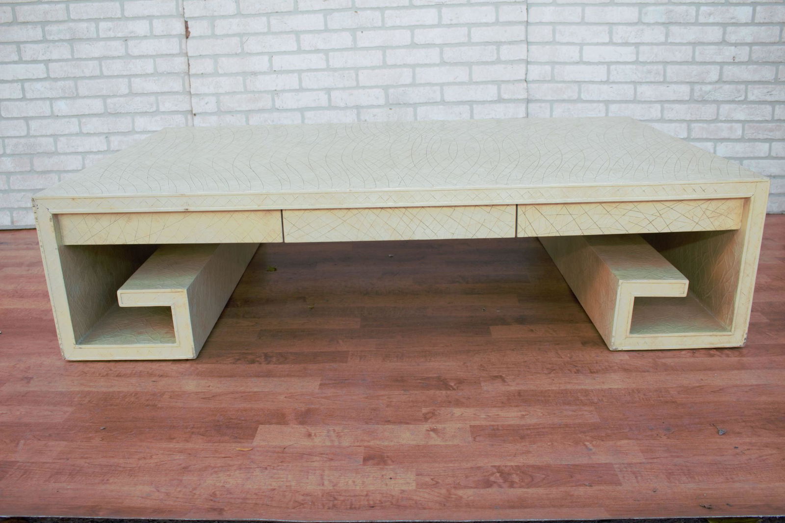 Thomas Pheasant for Baker Greek Key Crackle Lacquer: Thomas Pheasant for Baker Greek Key Crackle Lacquer Coffee Table Monumental Greek scroll shaped coffee table designed by Thomas Pheasant for Baker Furniture Company. Cream colored crackled lacquer fin