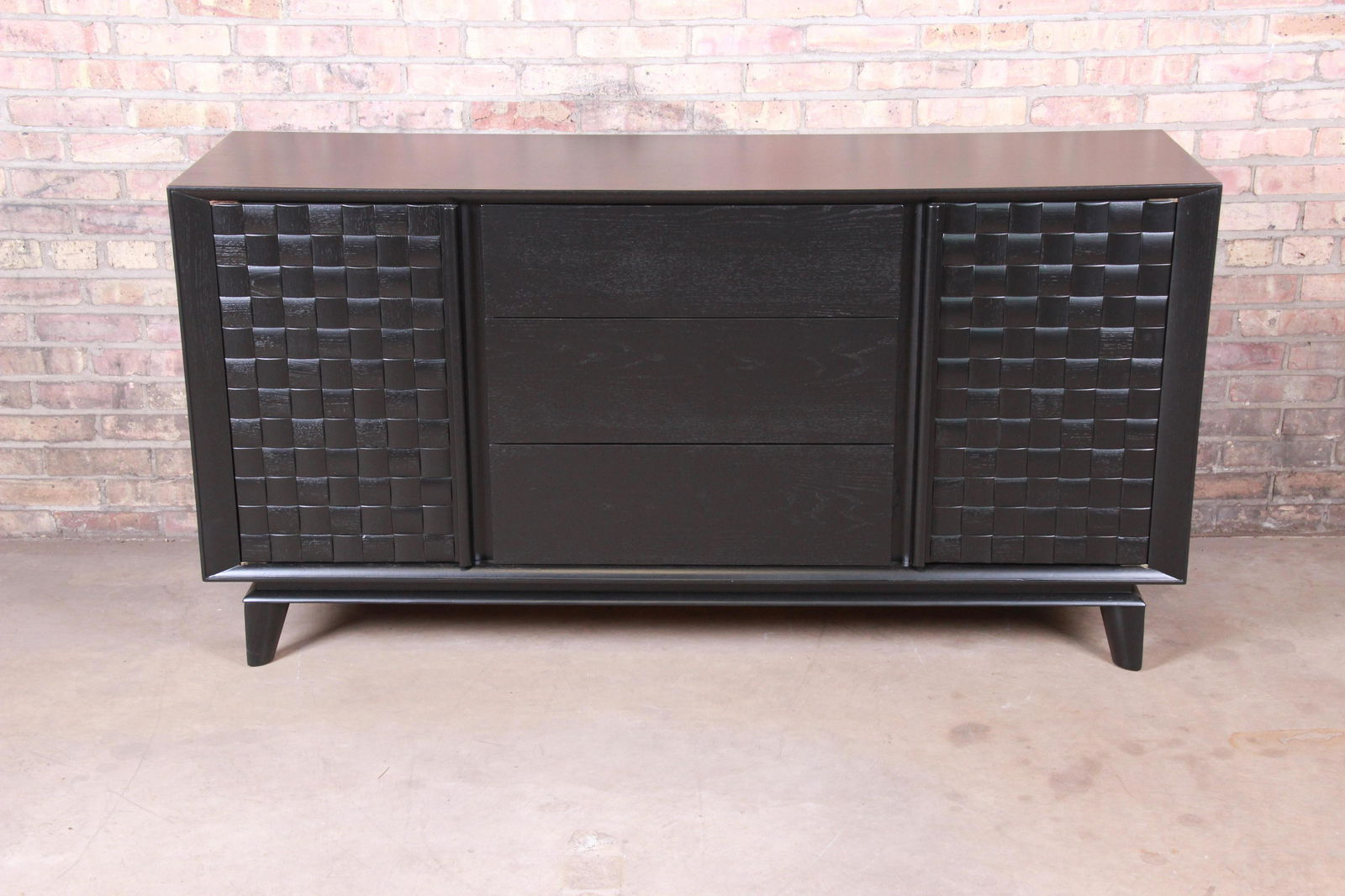 Authentic Paul Laszlo for Brown Saltman Ebonized: A rare and exceptional mid-century modern ebonized oak sideboard credenza or bar cabinet By Paul Laszlo for Brown Saltman USA 1950s Measures: 66"W x 19"D x 33.88"H. Newly refinished. Excellent conditi