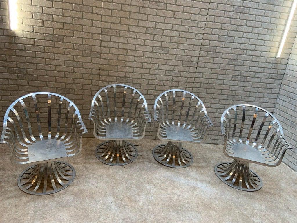 Mid Century Modern Polished Aluminum Tulip Shaped: Mid Century Modern Polished Aluminum Tulip Shaped Swivel Lounge Chairs by Russell Woodard - Set of 4 The price includes 4 custom pillows in your choice of color and fabric. Swatch samples can be sent 