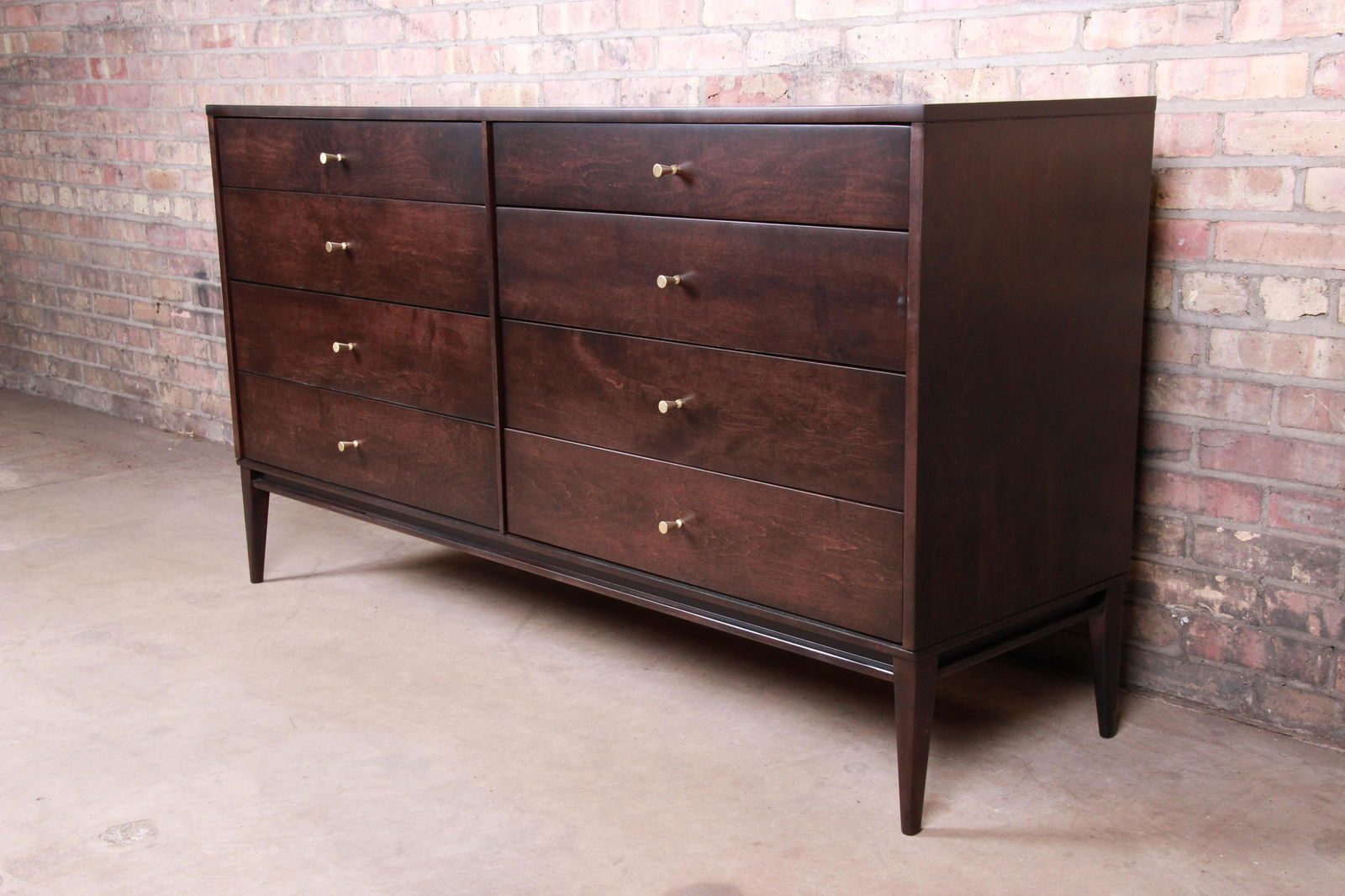 Authentic Paul McCobb Planner Group Mid-Century Modern: An exceptional mid-century modern eight-drawer dresser or credenza Designed by Paul McCobb for Winchendon Furniture "Planner Group" USA 1950s Solid birch + brass hardware Measures: 60"W x 18.25"D x 33
