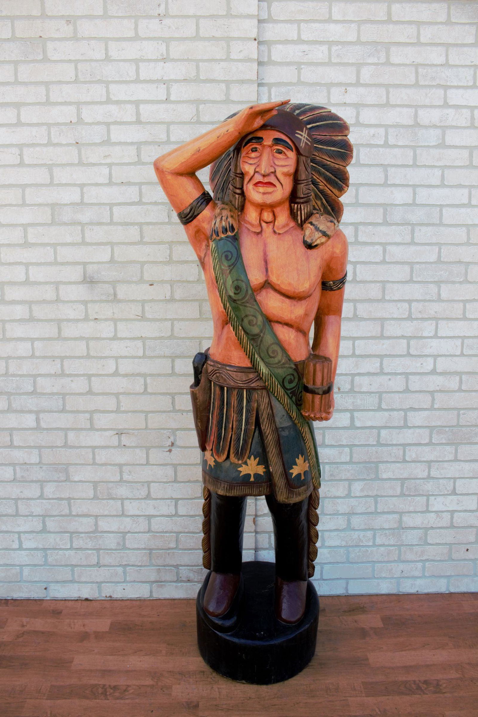 Vintage Carved Design Toscano Life Size Cigar Store: Carved Design Toscano Life Size Cigar Store Indian Tobacconist Statue The Indian Statue is on a wood base. Circa 1960 H 70 Indian H 63 W 22 D 15 Base H 7 W 16 Good vintage condition