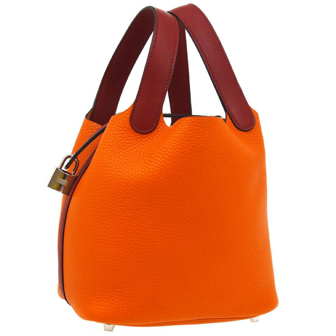 Authentic HERMES Picotin Lock Pm Hand Bag: Brand: HERMES Model: Picotin Lock Pm Hand Bag Country of Origin: France Material: Suede Color: Silver Size (Inch): W 7.1 x H 7.3 x D 5.1 " Handle Drop. 5.1 " Size (CM): W 18.0 x H 18.5 x D 13.0 cm Han