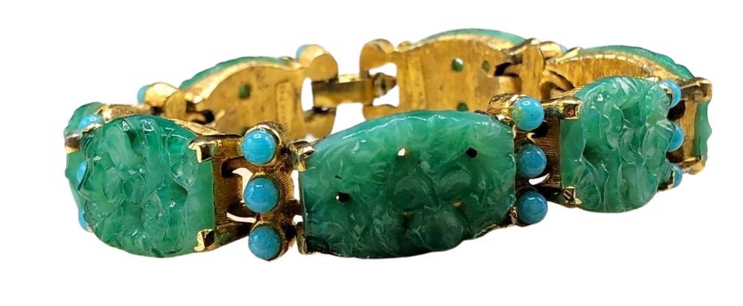 Authentic Jomaz Molded Glass Simulated Jade Bracelet: Brand: Jomaz Style: Bracelet Hallmark:: "Jomaz" Fastening: Category: Bracelet Materials: Gold-plated Size: Other Remarks: All Bidhaus items come with a 100% money-back authenticity guarantee. ALL SALE