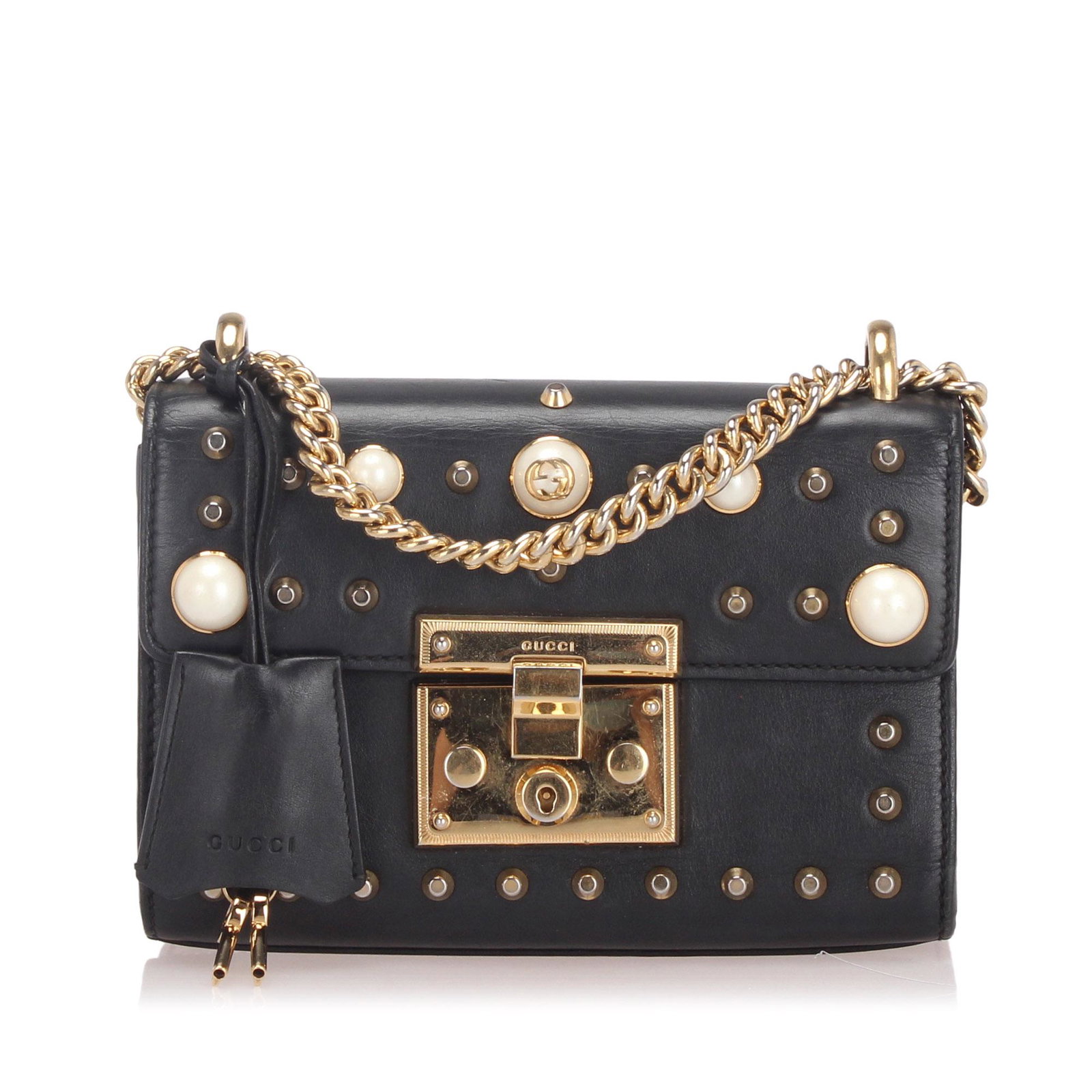 Authentic Gucci Small Studded Padlock Leather: The Padlock features a studded leather body gold-tone chain straps a top flap with push lock closure and an interior slip pocket. Brand: Gucci Model: Small Studded Padlock Leather Shoulder Bag Origin: