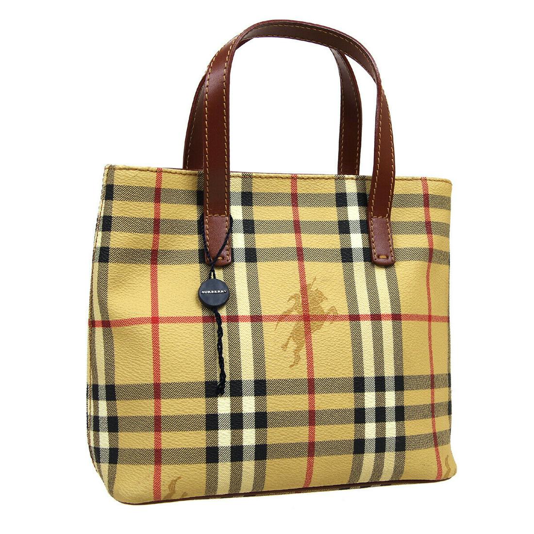 Authentic BURBERRY Hand Bag Double Handles: Brand: BURBERRY Model: Hand Bag Double Handles Country of Origin: Italy Material: Canvas Color: Beige Brown Size (Inch): W 8.3 x H 7.5 x D 4.3 " Handle Drop. 3.1 " Size (CM): W 21.0 x H 19.0 x D 11.0