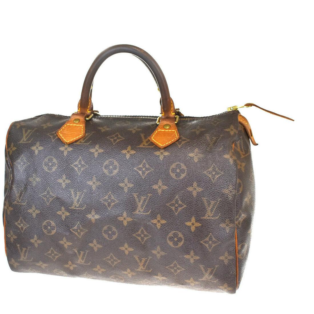 Authentic LOUIS VUITTON Hand Bag: Brand: LOUIS VUITTON Model: Hand Bag Country of Origin: France Material: Monogram Leather Color: Brown Size (Inch): W 11.8 X H 8.3 X D 6.7 "Size (CM): W 30 X H 21 X D 17 Cm All Bidhaus items come with