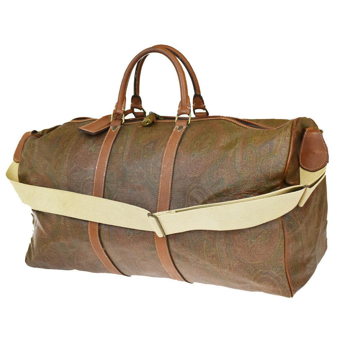 Authentic ETRO Shoulder Hand Bag: Brand: ETRO Model: Shoulder Hand Bag Country of Origin: Italy Material: PVC Leather Color: Brown Size (Inch): W23.2X H12.6X D10.2"Size (CM): W59X H32X D26Cm All Bidhaus items come with a 100 % money-b