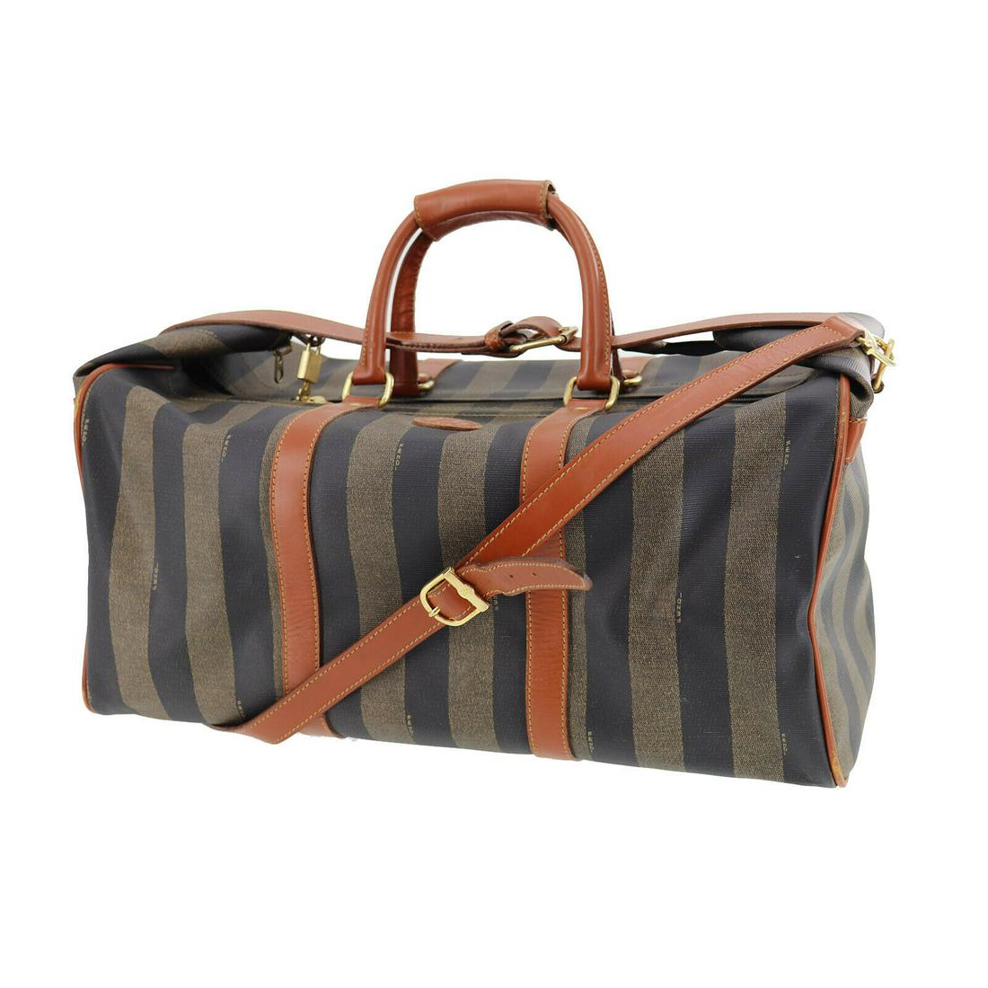 Authentic FENDI Boston Bag: Brand: FENDI Model: Boston Bag Country of Origin: Italy Material: Canvas Color: Gold Size (inch): extra large All Bidhaus items come with a 100 % money-back authenticity guarantee. ALL SALES ARE FINAL