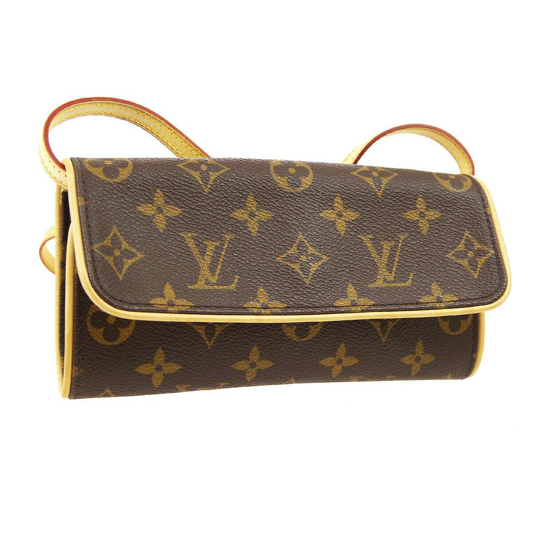Authentic LOUIS VUITTON Pochette Twin Pm Crossbody: Brand: LOUIS VUITTON Model: Pochette Twin Pm Crossbody Strap Country of Origin: Spain Material: Alcantara Color: Brown Size (Inch): W 7.5 x H 3.9 x D 1.0 " Strap Drop. 20.1 " Size (CM): W 19.0 x H 10.