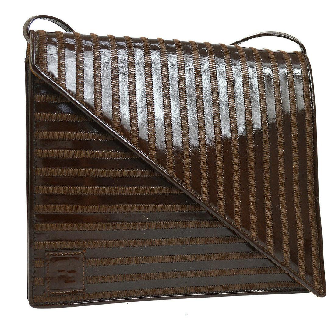 Authentic FENDI Crossbody: Brand: FENDI Model: Crossbody Country of Origin: Italy Material: Patent Leather Color: Brown Size (Inch): W 7.7 x H 6.7 x D 2.4 " Strap Drop. 17.7 - 20.1 " Size (CM): W 19.5 x H 17.0 x D 6.0 cm Strap 