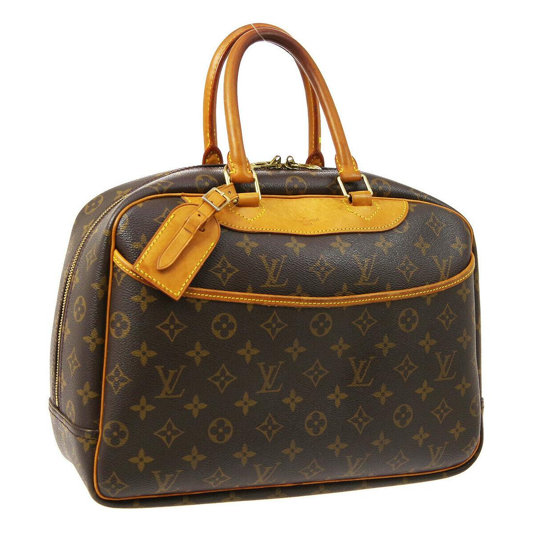 Authentic LOUIS VUITTON Deauville Double Handles: Brand: LOUIS VUITTON Model: Deauville Double Handles Country of Origin: France Material: Leather Color: Brown Size (Inch): W 13.8 x H 10.2 x D 5.1 " Handle Drop. 5.5 " Size (CM): W 35.0 x H 26.0 x D 1